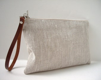 small clutch bag with wrist strap