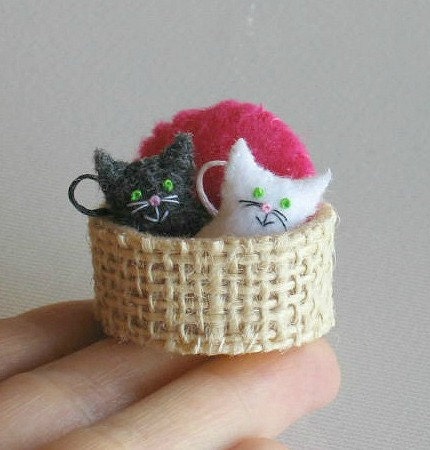 stuffed kittens in a basket