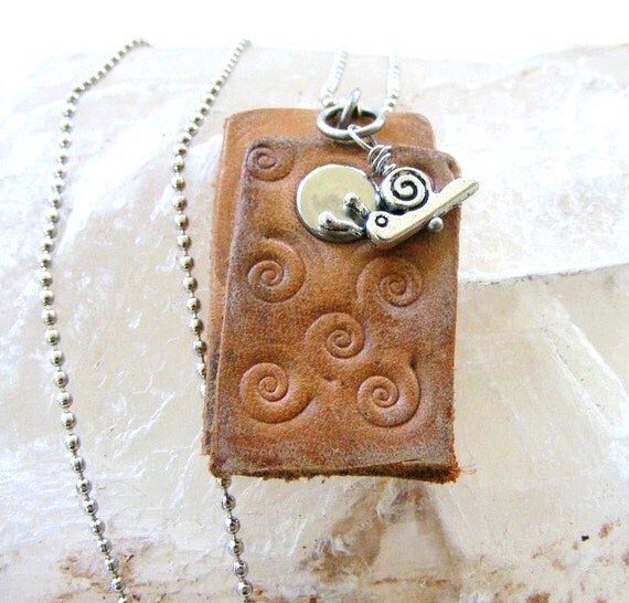 Swirls and Snail Stamped Leather Pendant and by meiguidesigns