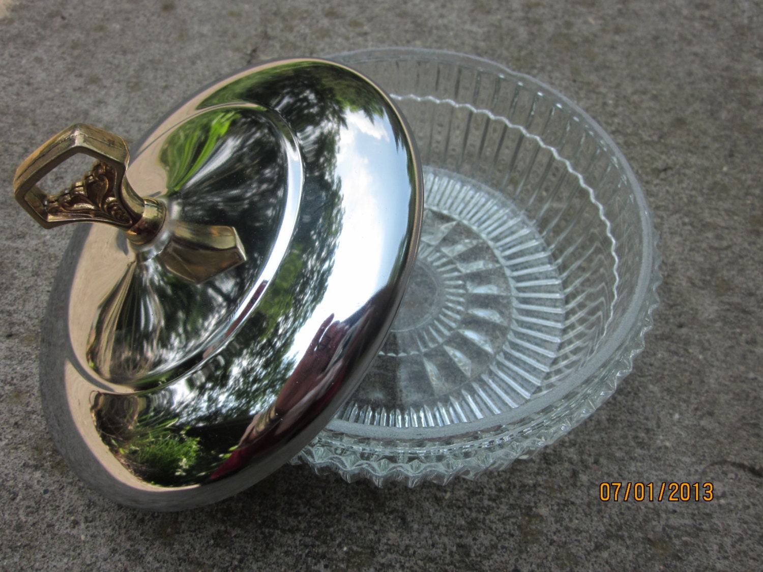 beautiful pressed glass candy dish with a silver metal top gold handle