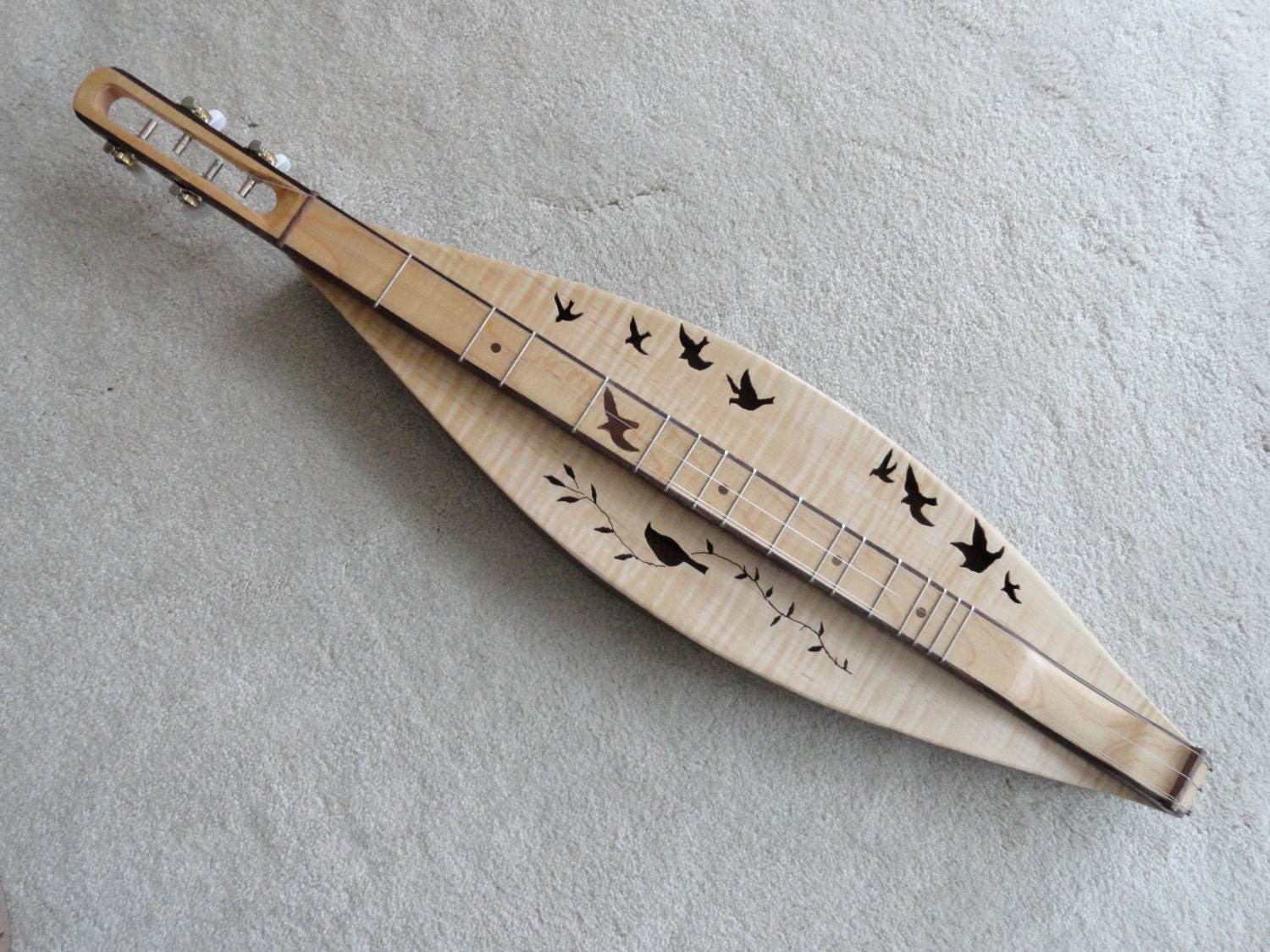 4 string mountain dulcimers with 10 birds and a vine