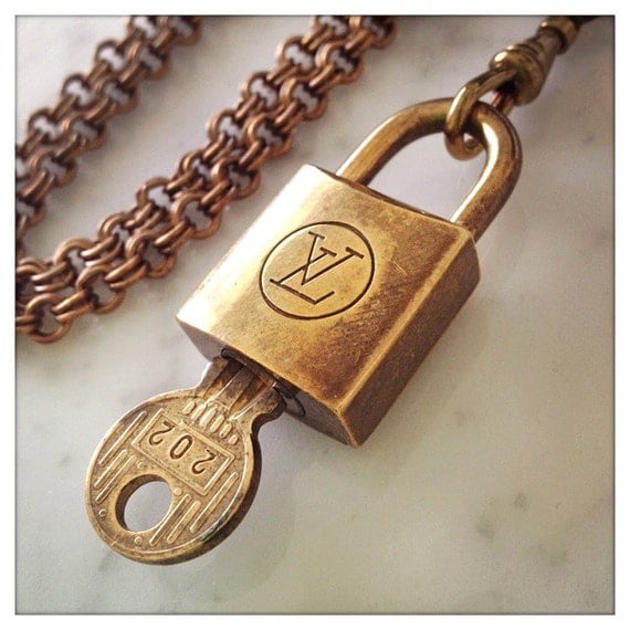 Authentic Vintage 60s LOUIS VUITTON Lock on Old Gold Double