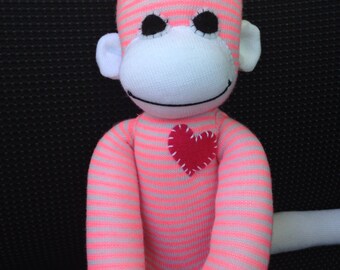 pink striped sock monkey