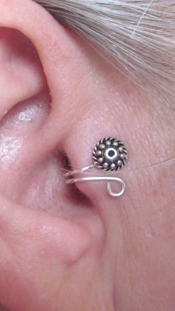 Grano En El Piercing De La Oreja