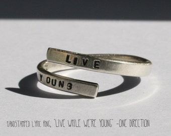Hand stamped One Direction, Silver lyric ring. Live while we're young