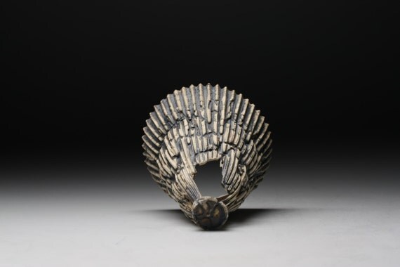 Abstract ceramic sculpture with unique shape and by madebymanos