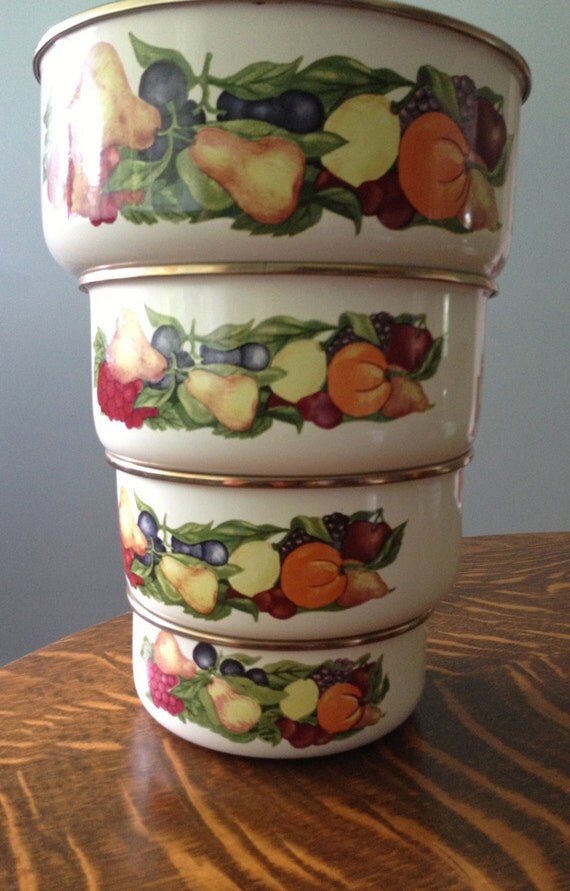 Items similar to Nesting vintage metal fruit bowls with tops, 7 pieces