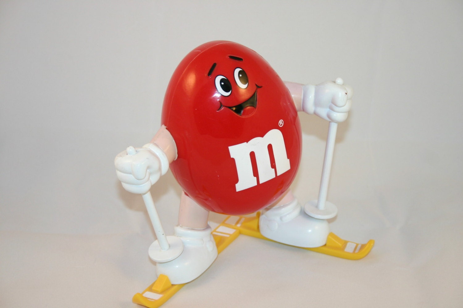 Vintage red M&M candy holder collectible ski figurine 6 1/2
