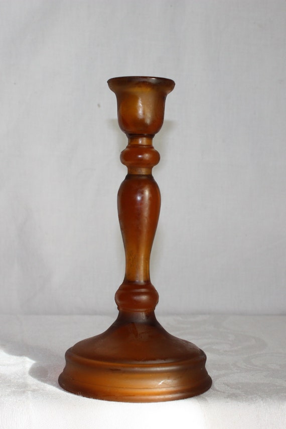Amber glass taper candle holder 8 inches tall base is over 4