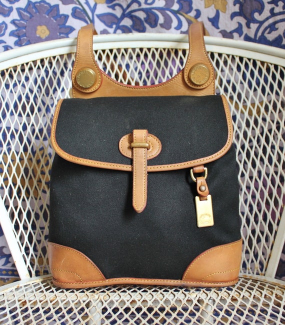Vintage Dooney & Bourke Black And Tan Cabriolet Canvas And