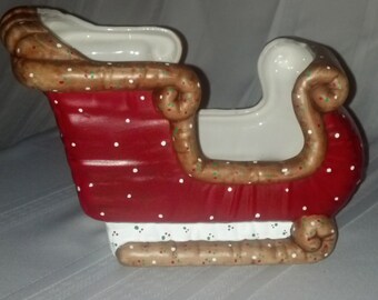 Ceramic very nicely done hand painted santa sleigh planter/serving dish.