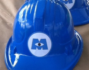 Plastic monsters inc. and monsters university scaring assistant helmets/hats for birthday parties or costume. One hat only