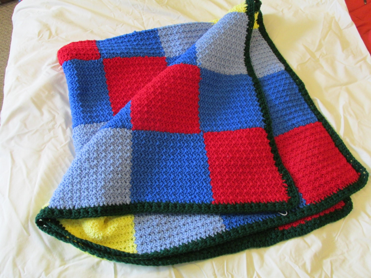 Small afghan or lap blanket in primary colors by RobinsKnit