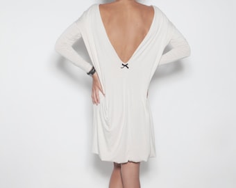 White dress | Backless dress | Dress with black bow | LeMuse white dress