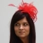 Bright red dutch design feather fascinator with lots and lots off different feathers all in ton sur ton