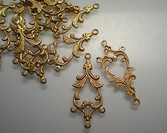 12 ornate brass connectors