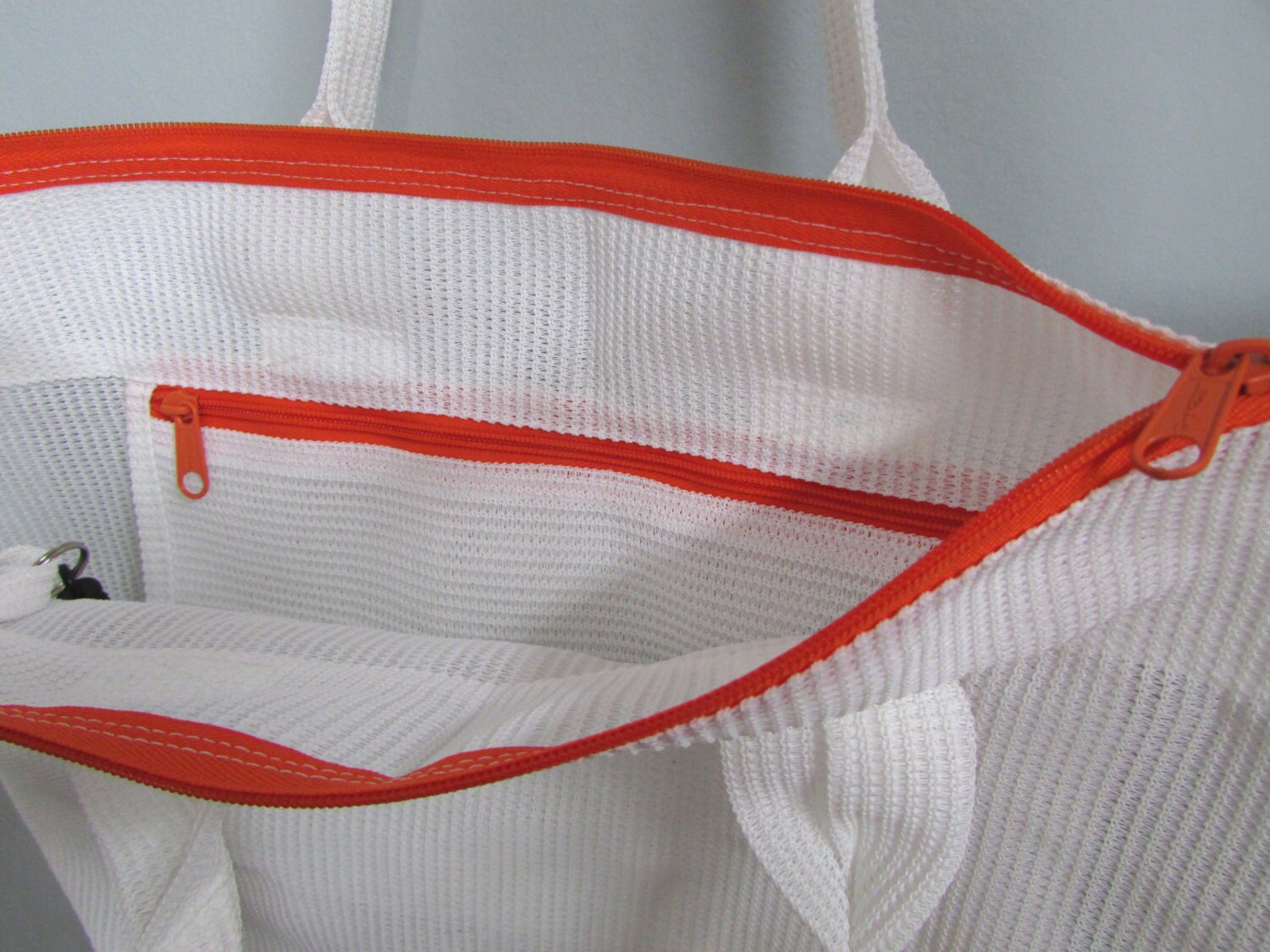 small white mesh bags