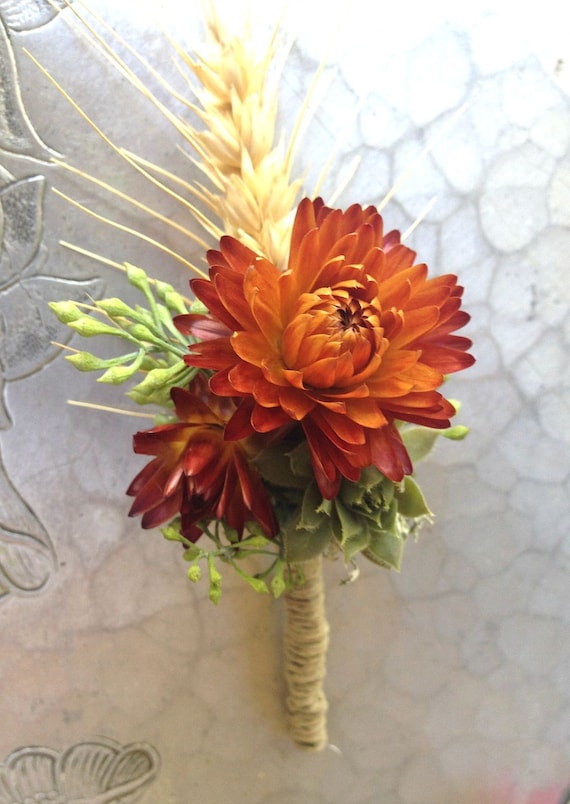 Boutonnière orange straw flower with succulent and wheat