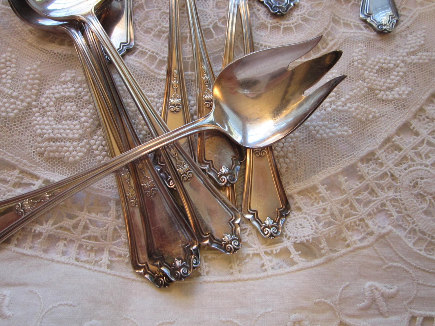 12 vintage silverplated ice cream forks GM Co with anchor