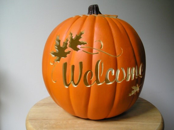 Carved welcome orange pumpkin with maple by purpleinkgraphics Carved welcome orange pumpkin with maple by purpleinkgraphics