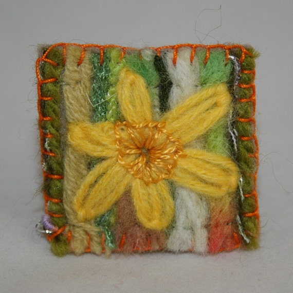Embroidered Brooch  Daffodil on Felted background by Lynwoodcrafts