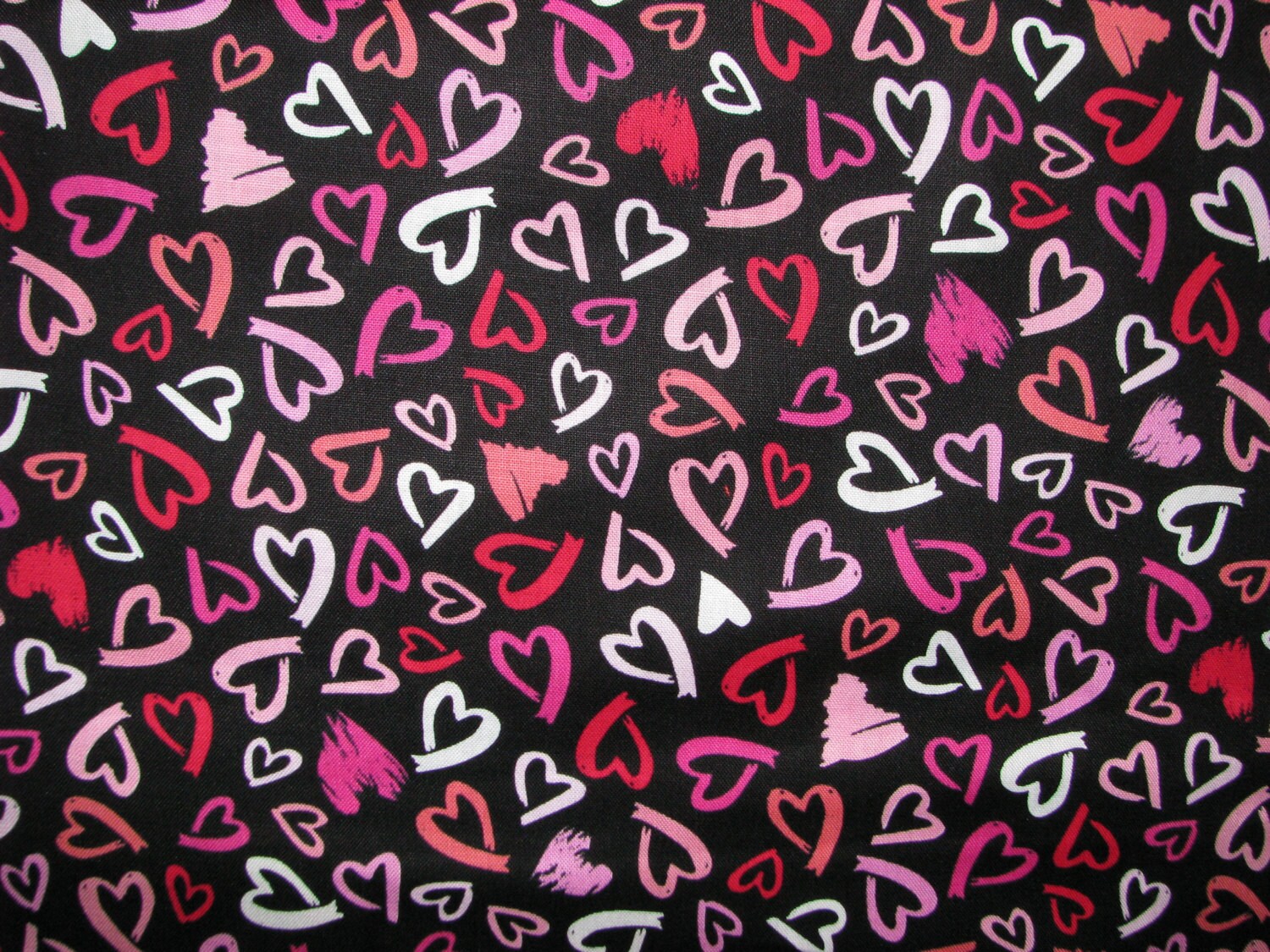 Lipstick Hearts cotton fabric black with hearts drawn in