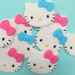 RESERVED Hello Kitty cake topper set