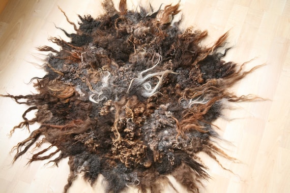 Hand felted round rug with different wool locks, alpace, merino, wensleydale
