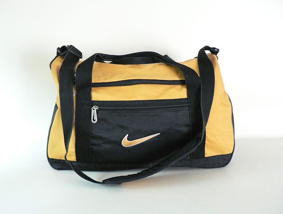 Vintage Gold and Black Canvas Duffel Bag by Nike