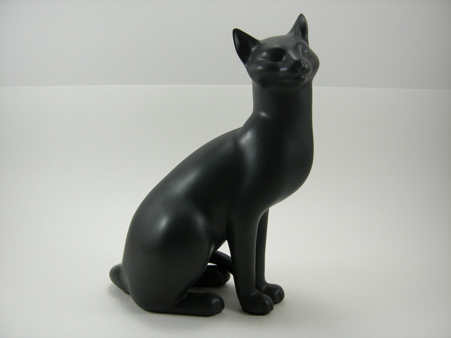 porcelain cat statues