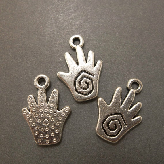 Items similar to 5pcs silver hand charms on Etsy