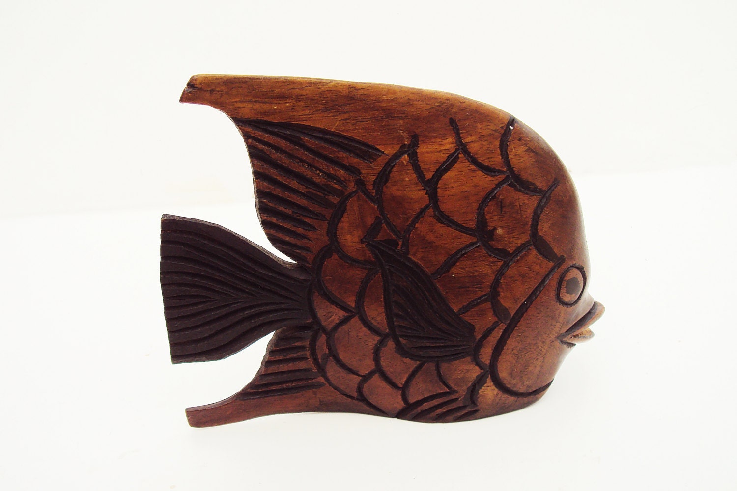 large wooden fish sculpture