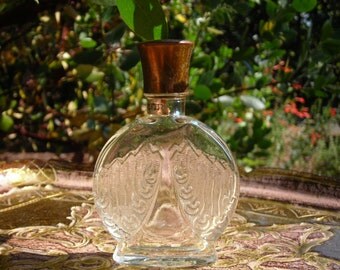 empty vintage Corday Toujours Moi eau de toilette bottle, 3.75 inches tall.