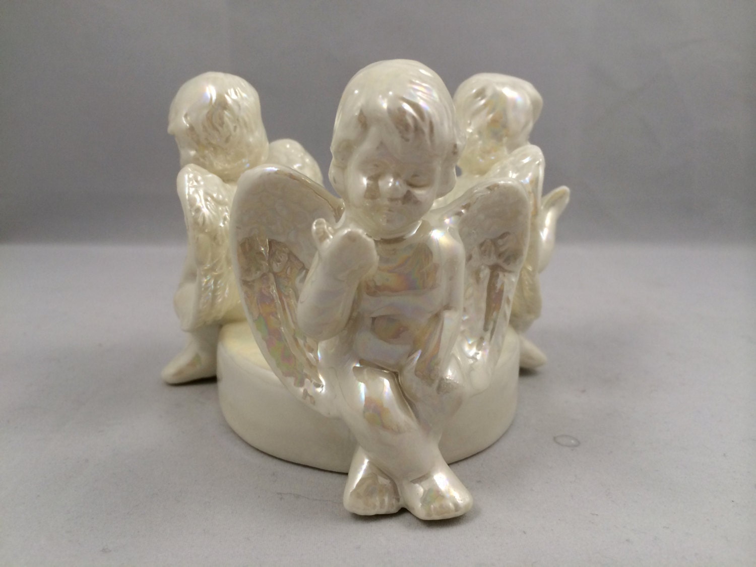 Cherub candle holder iridescent cherub candle holder by DotnBettys