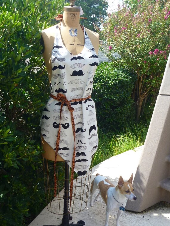 Items similar to Mustache apron reversible orange & black on Etsy