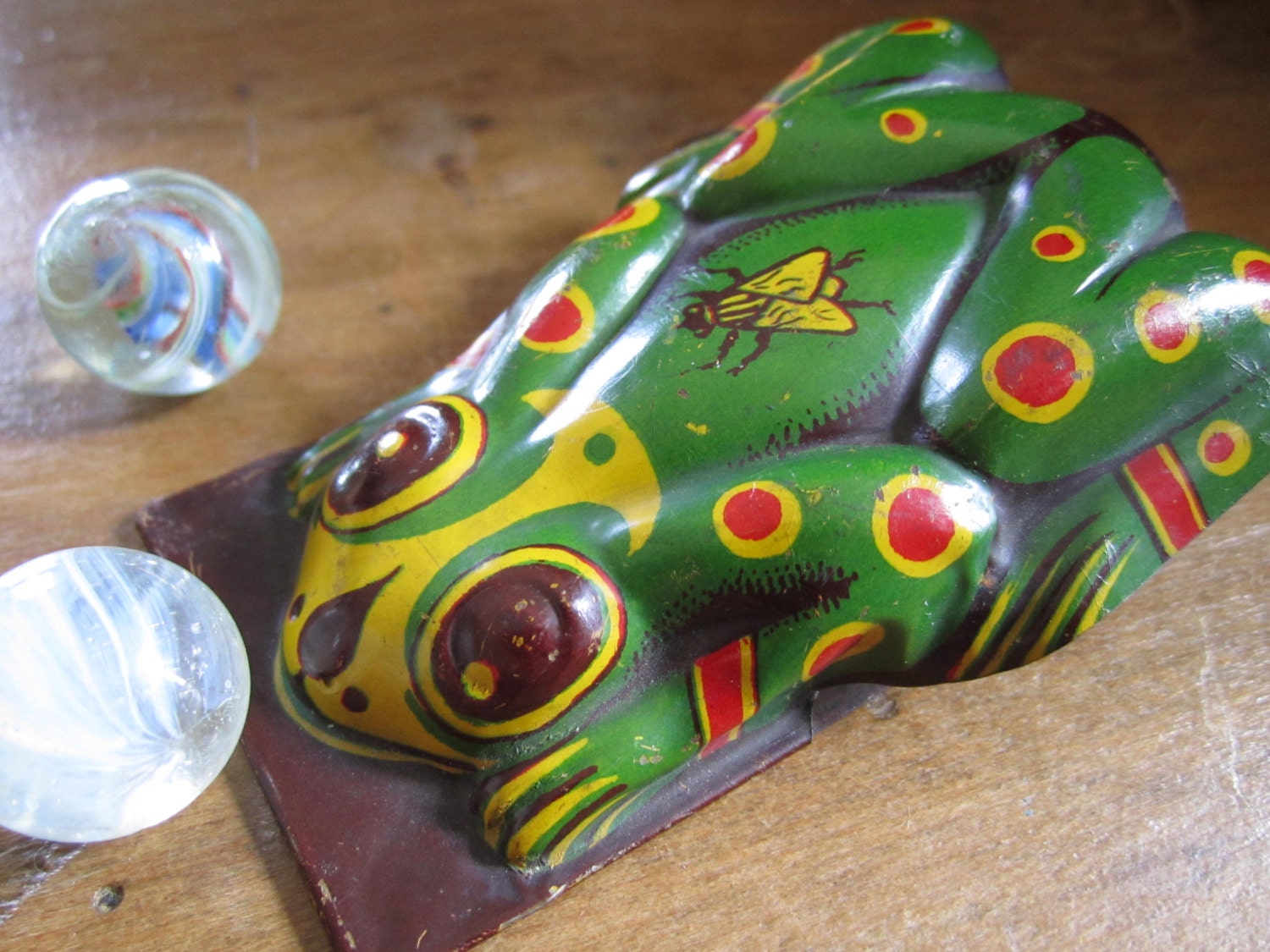 tin clicker toy