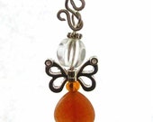 https://www.etsy.com/ie/listing/170299846/butterfly-fairy-charm-carnelian-rear?ref=shop_home_active_3&ga_search_query=fairies