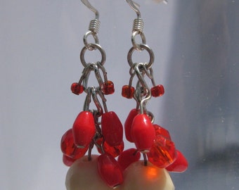 Silver wire earrings: Ivory and coral colored beads