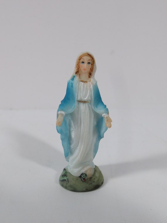 miniature virgin mary statue