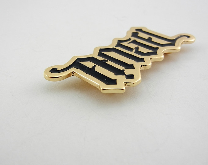 Gold-tone and Black Epoxy Pendant Spelling Angel