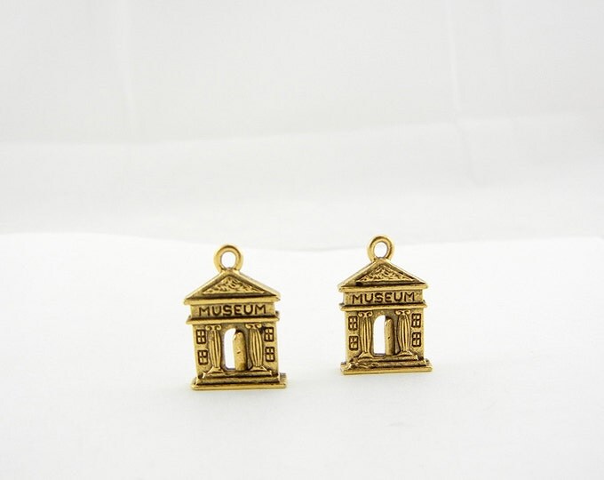 Two Gold-tone Pewter Museum Facade Charms