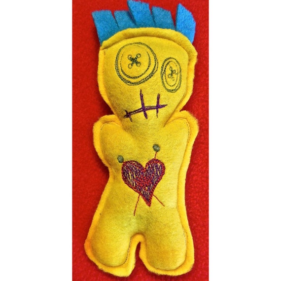 yellow voodoo doll