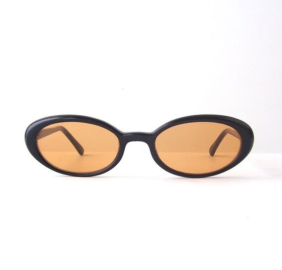 vintage sunglasses orange colored lenses amber black frames