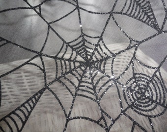 Halloween fabric spiderweb sheer fabric spooky textured spider web fabric.