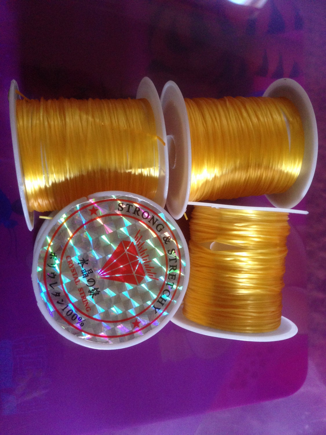 Roll Yellow Gold Elastic Beading thread 0.5mm by BeadsBitznBopz