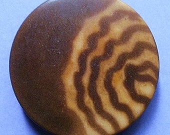 Corozo nut button, Art Deco, dyed with a flowing design. c1930's.