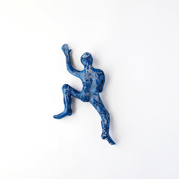 wall climbing figurines