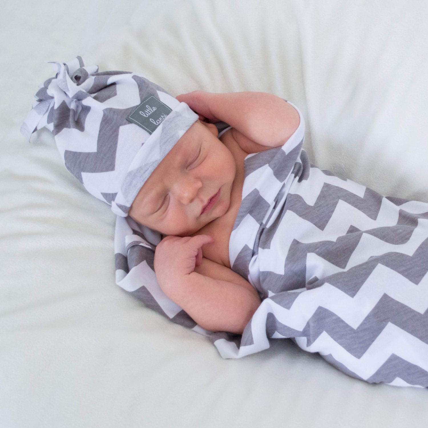 Grey and white jersey knit chevron swaddle blanket 36x35.