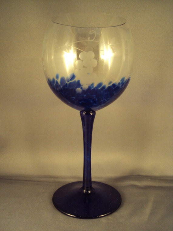 Cobalt blue spatter wine glass with etched grape motif