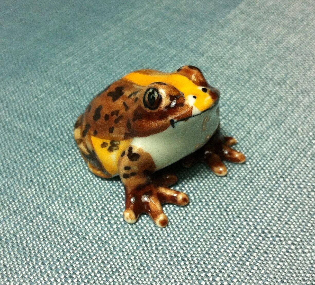 tiny ceramic frog